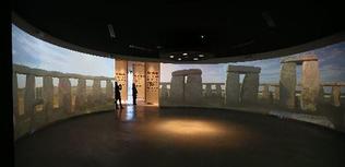 Visitors look at the audio-visual exhibits at Stonehenge  Alastair Grant / AP 