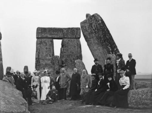 A group of Victorian tourists pose in front of Stonehenge, c1900. © Corbis